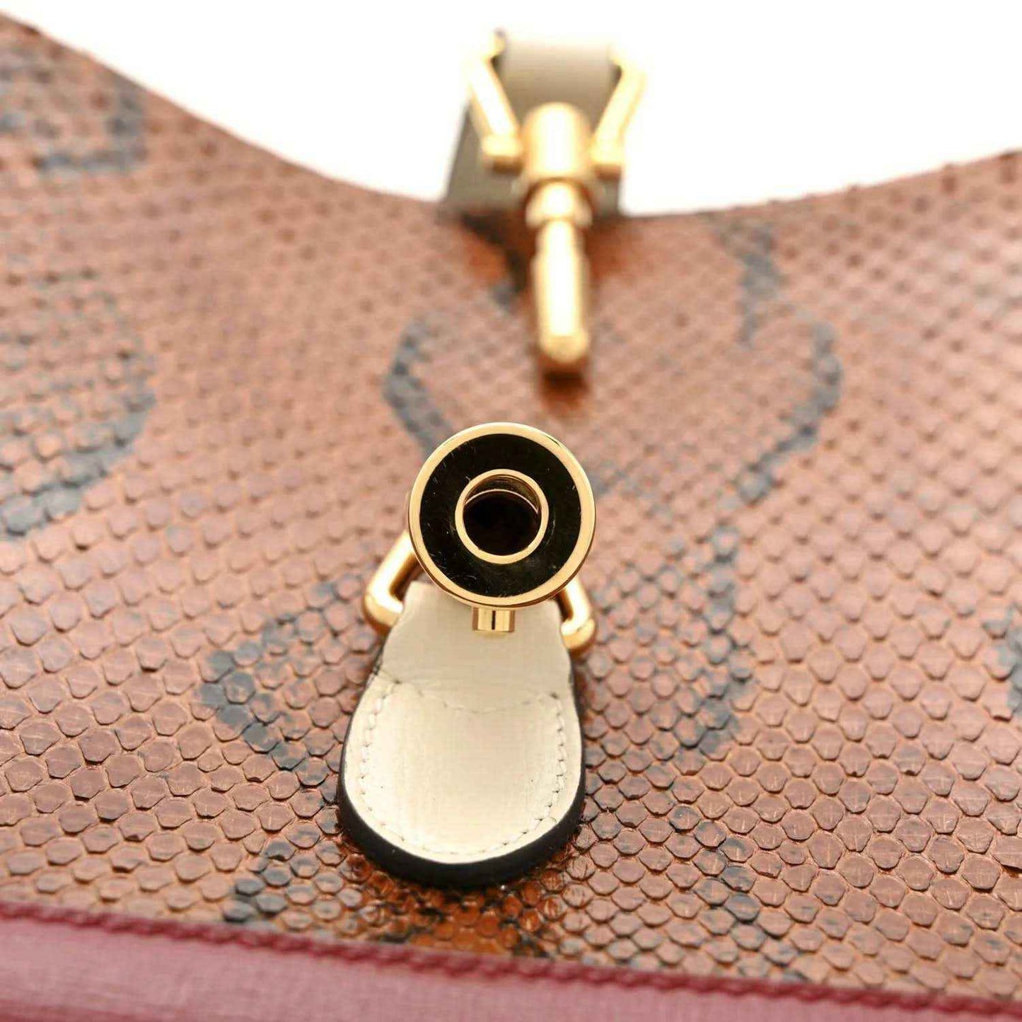 Small hobo bag top hardware with gold ring and multicolor snakeskin