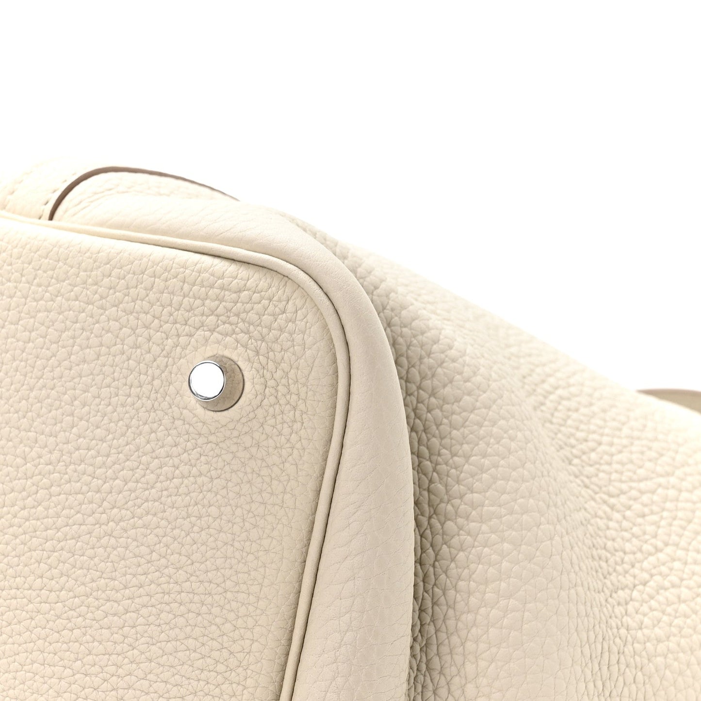 Ivory leather tote bag side panel with round metal button hardware