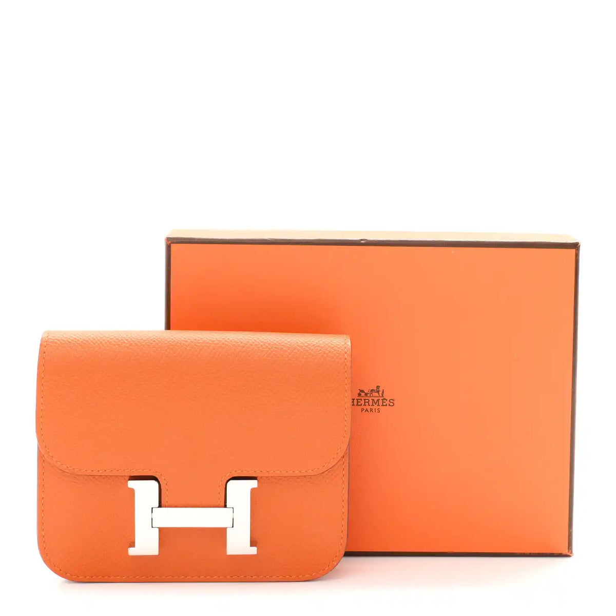 Orange Epsom leather slim wallet with H clasp, shown with orange box.