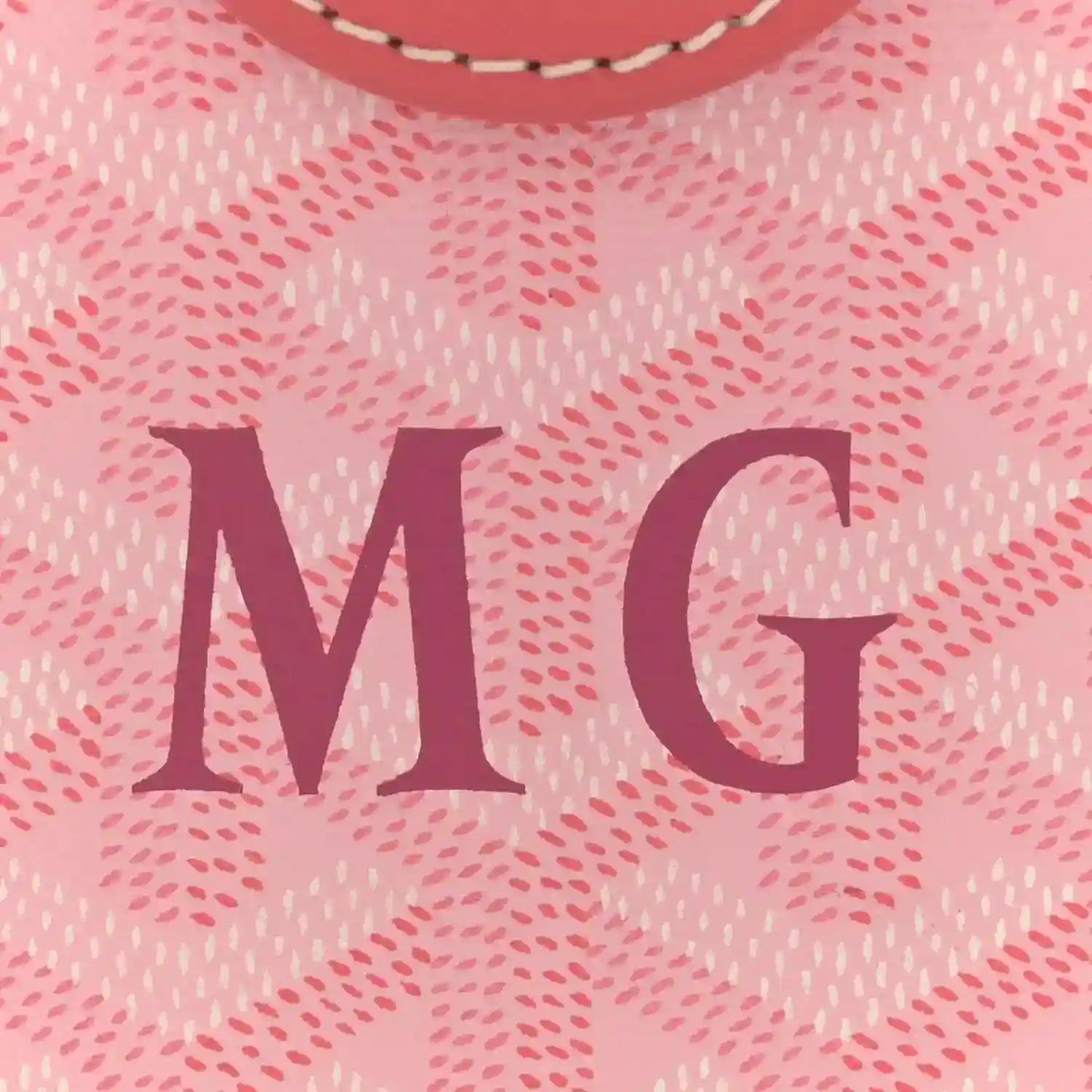 Pink canvas bag with large MG lettering
