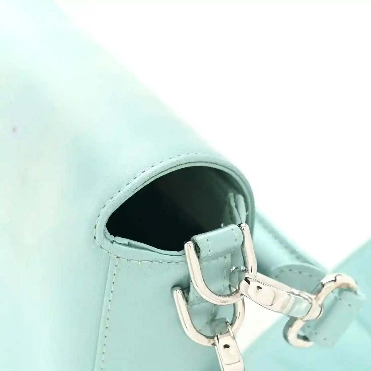 Light blue satin nappa baguette bag, silver-toned clasp and strap hardware