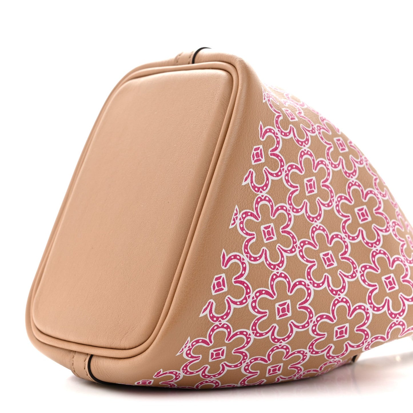 Micro tote bag side view with magenta floral panel and tan leather back