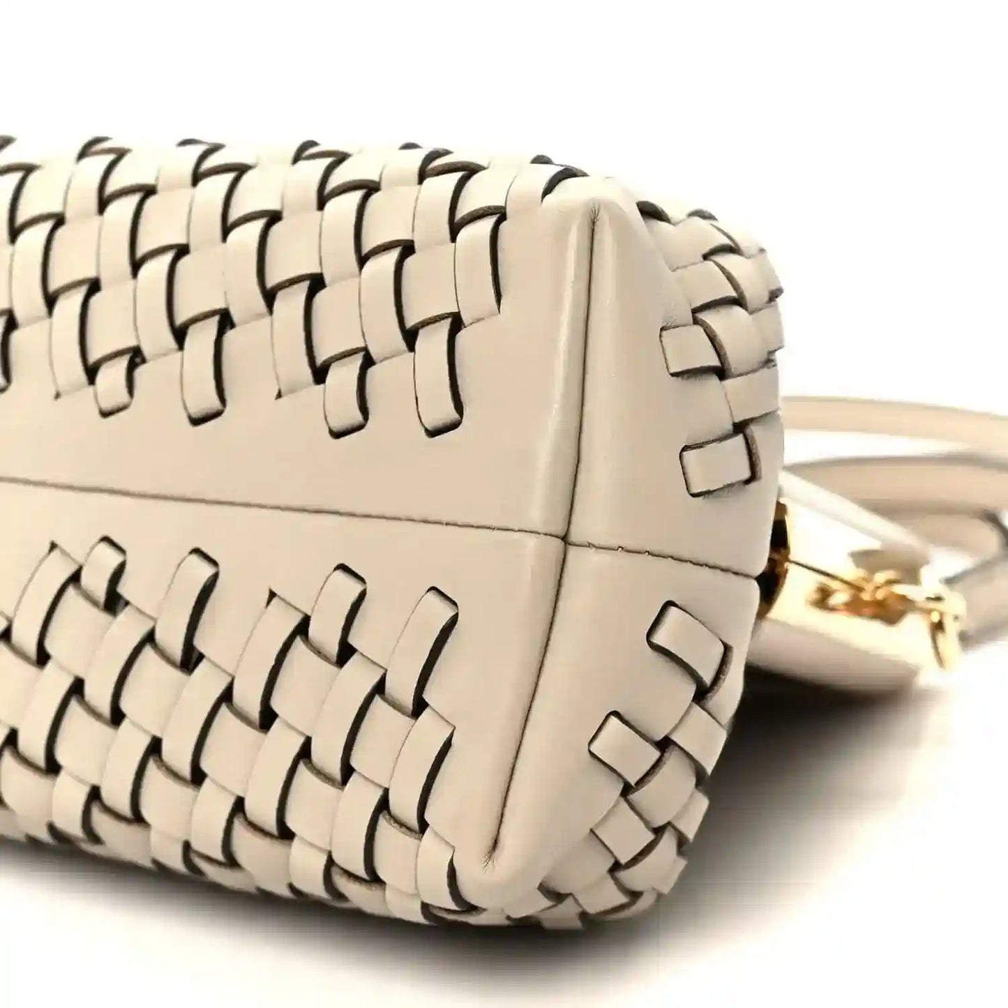 Ivory woven leather clutch with gold-tone hardware and shoulder strap attachment
