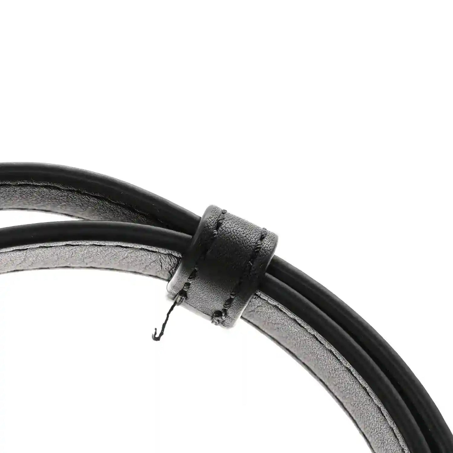 Black leather strap with adjustment loop and metal hardware