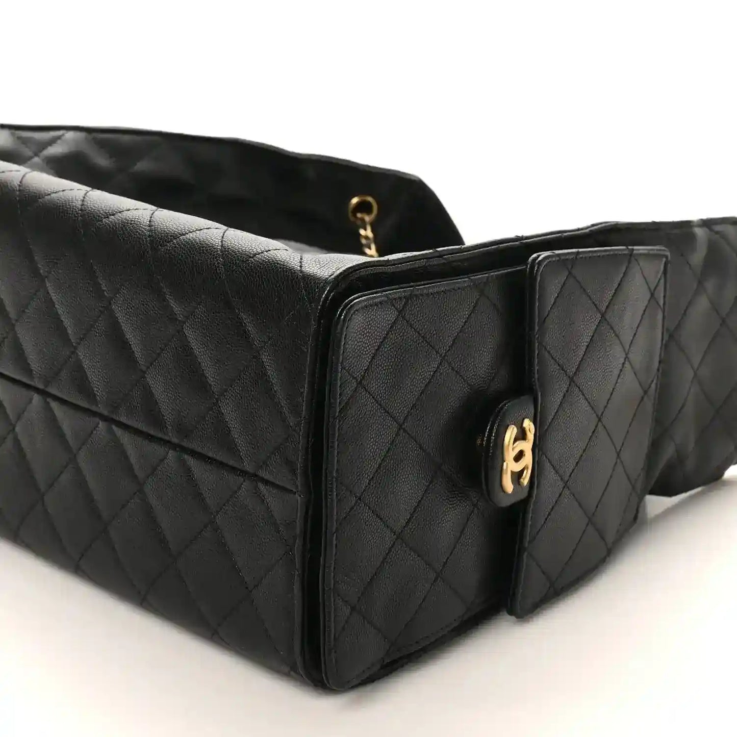 Black Chanel quilted leather handbag with gold-tone handle hardware and flap front, medium