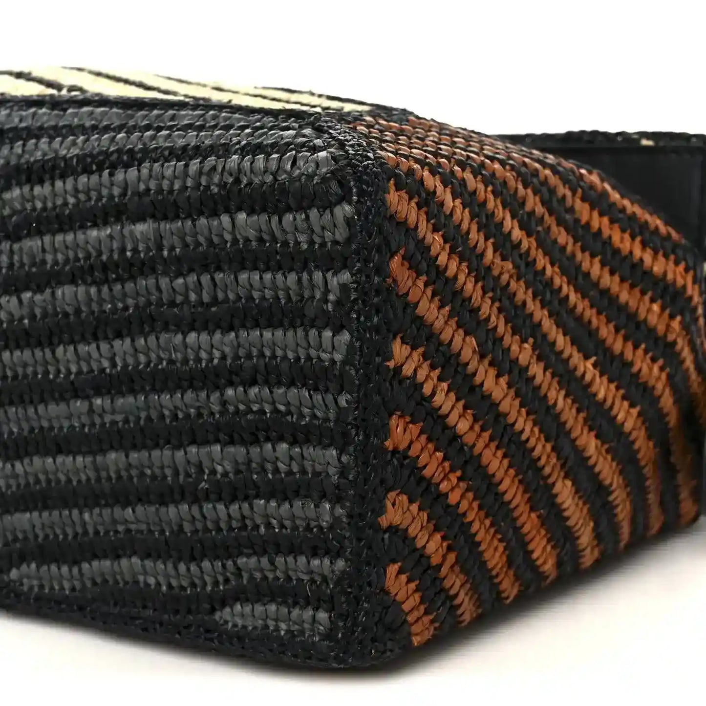 Small raffia puzzle bag weave detail with black and orange striped pattern