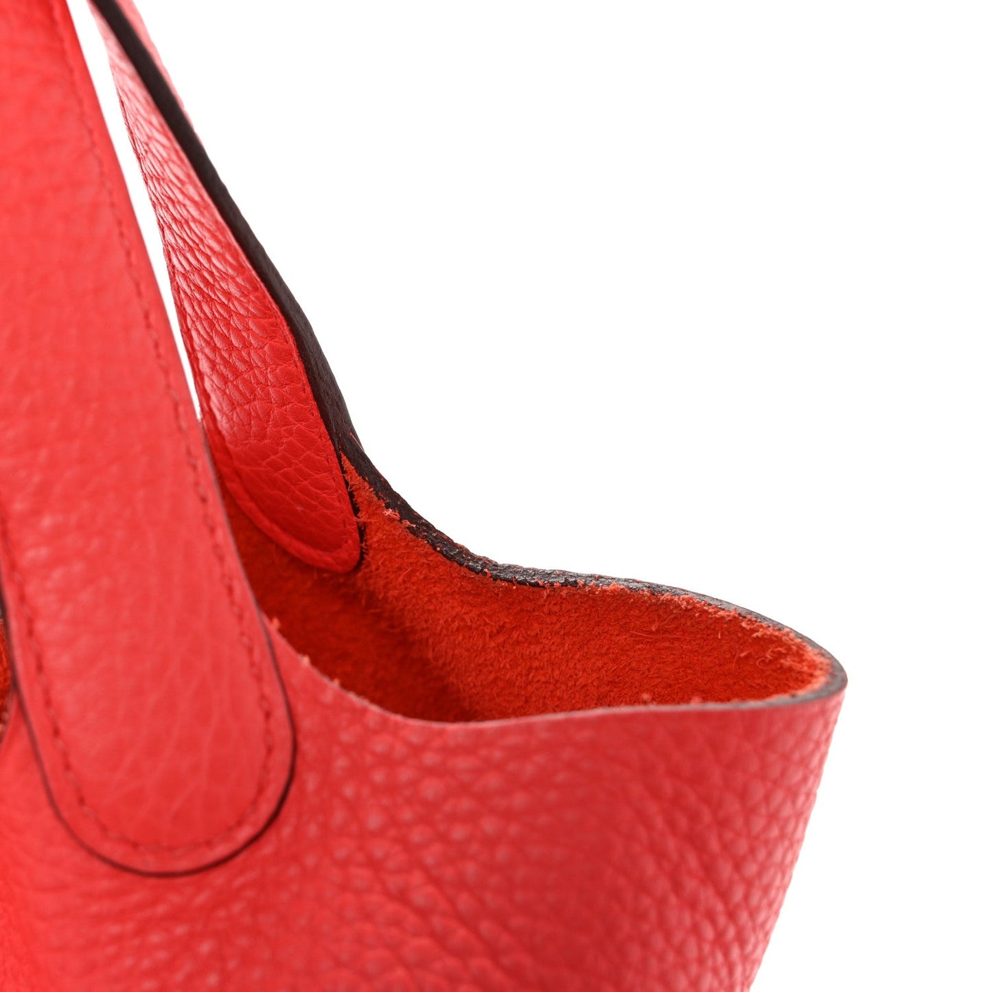 Rose leather tote bag side view with handle loops and interior lining