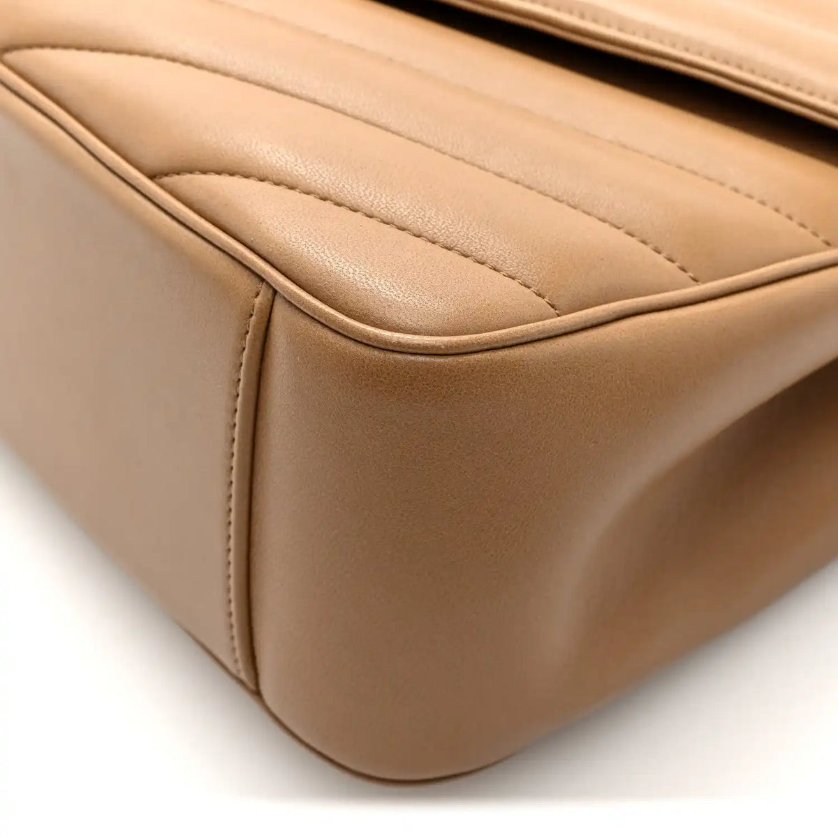 Large Loulou bag in natural tan chevron quilted lambskin leather, curved side edge