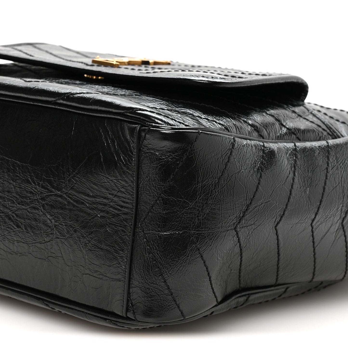 Black quilted leather tote closeup with textured crinkled finish
