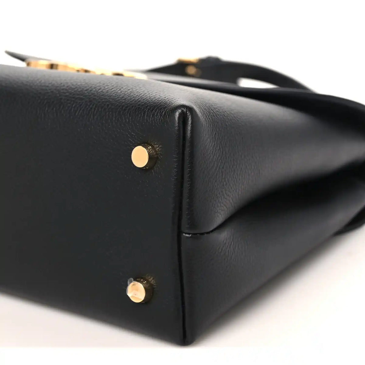 Black Celine medium shoulder bag end view with gold-tone studs on leather