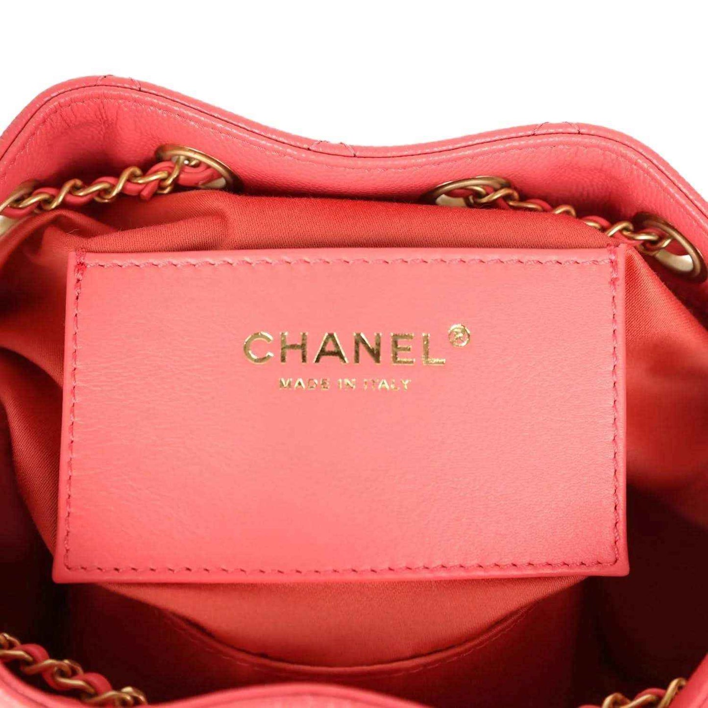 Coral pink interior label reading CHANEL and MADE IN FRANCE