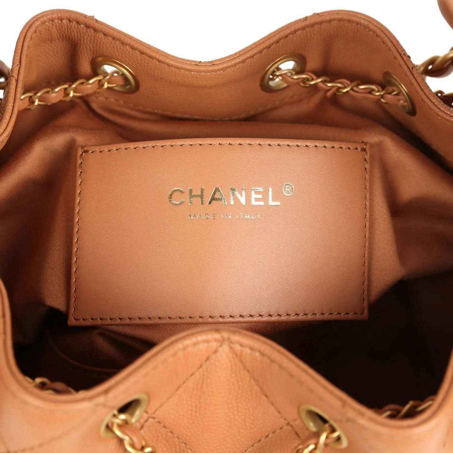 Chanel leather interior label on brown hobo bag lining with gold hardware
