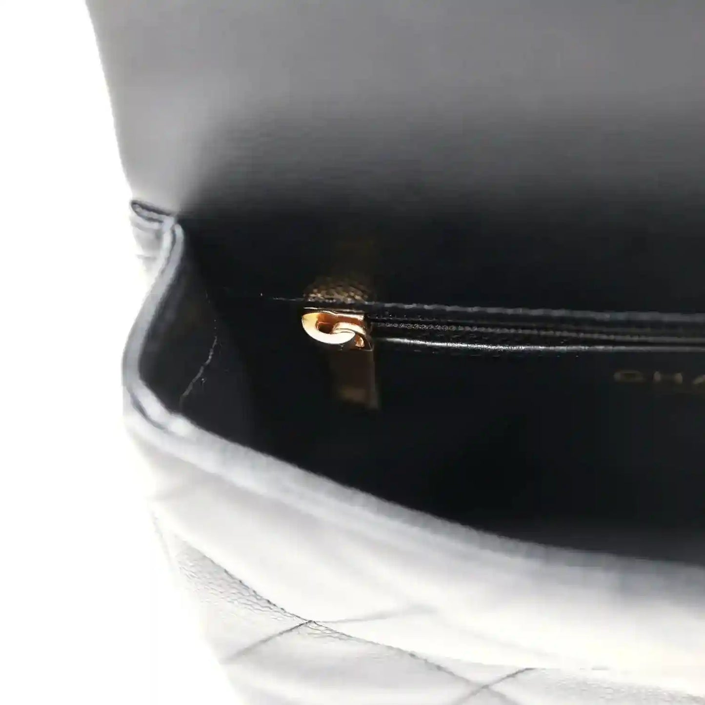 Chanel mini square flap bag, black caviar with gold clasp detail