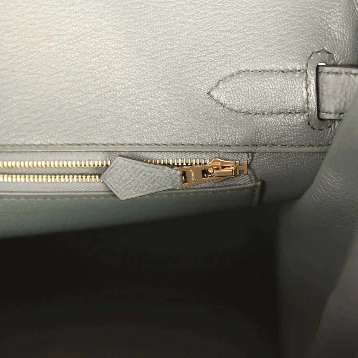 Hermes Birkin 30 interior pocket with gold zipper pull on green leather lining