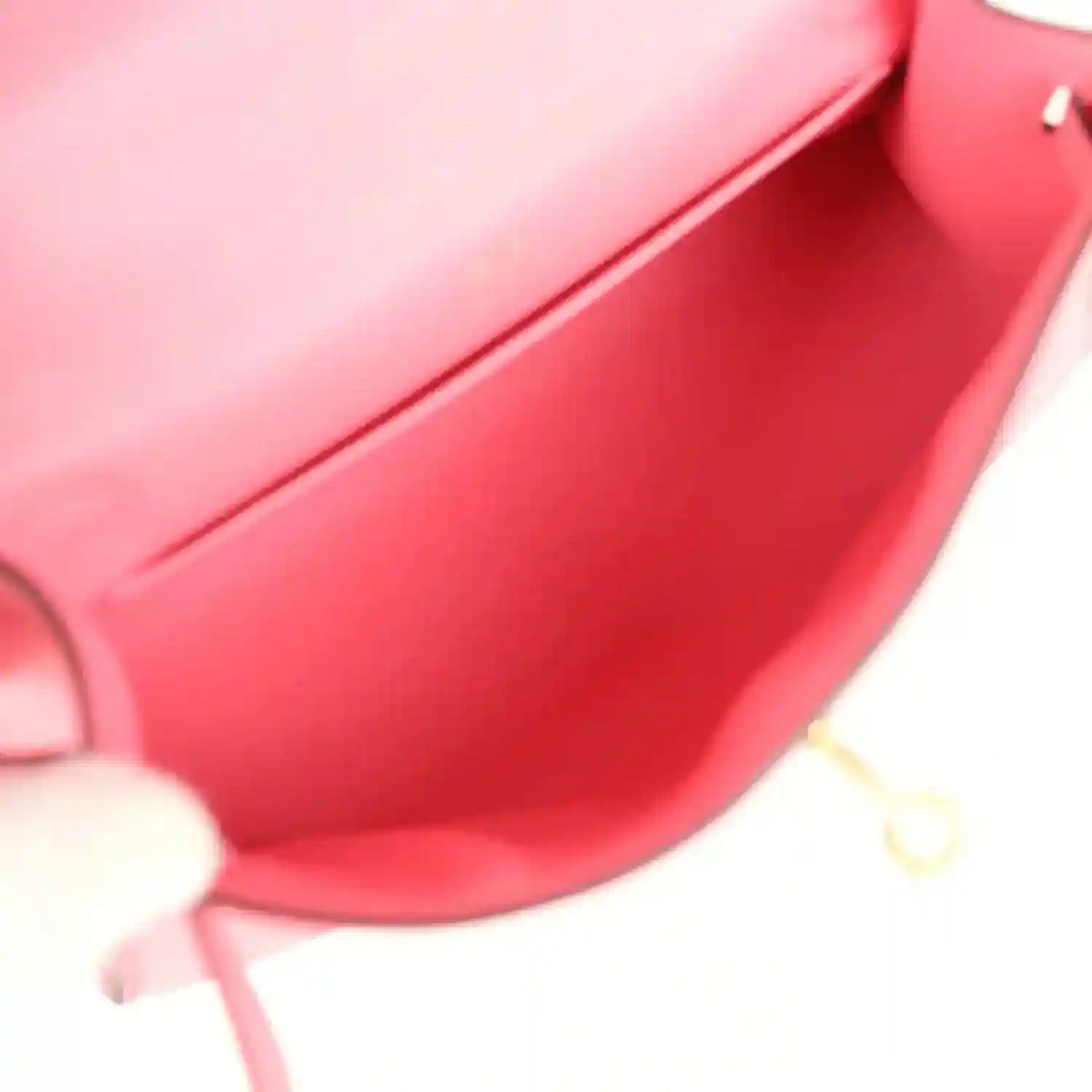 Hermes Kelly pochette bag interior in rose pink leather with turn-lock hardware