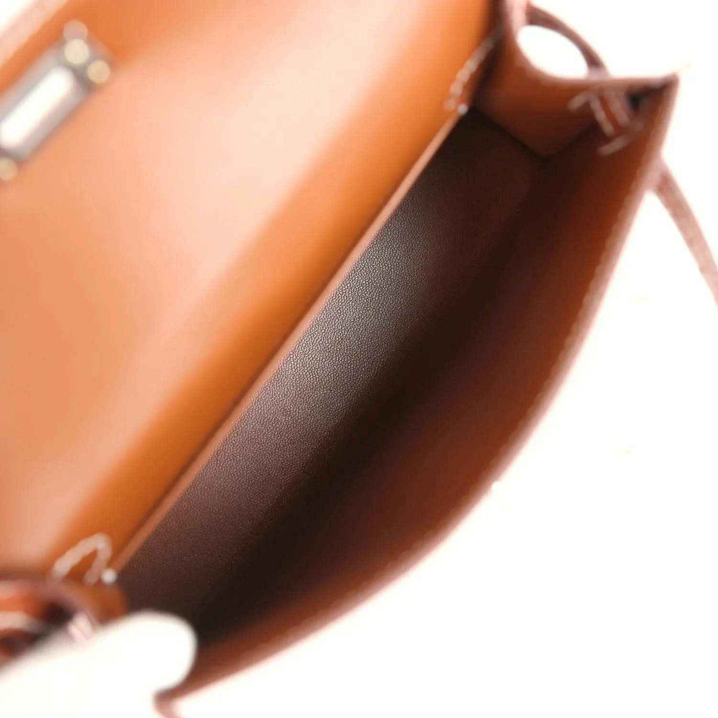Croc leather bag interior with dark lining and top edge stitched detail