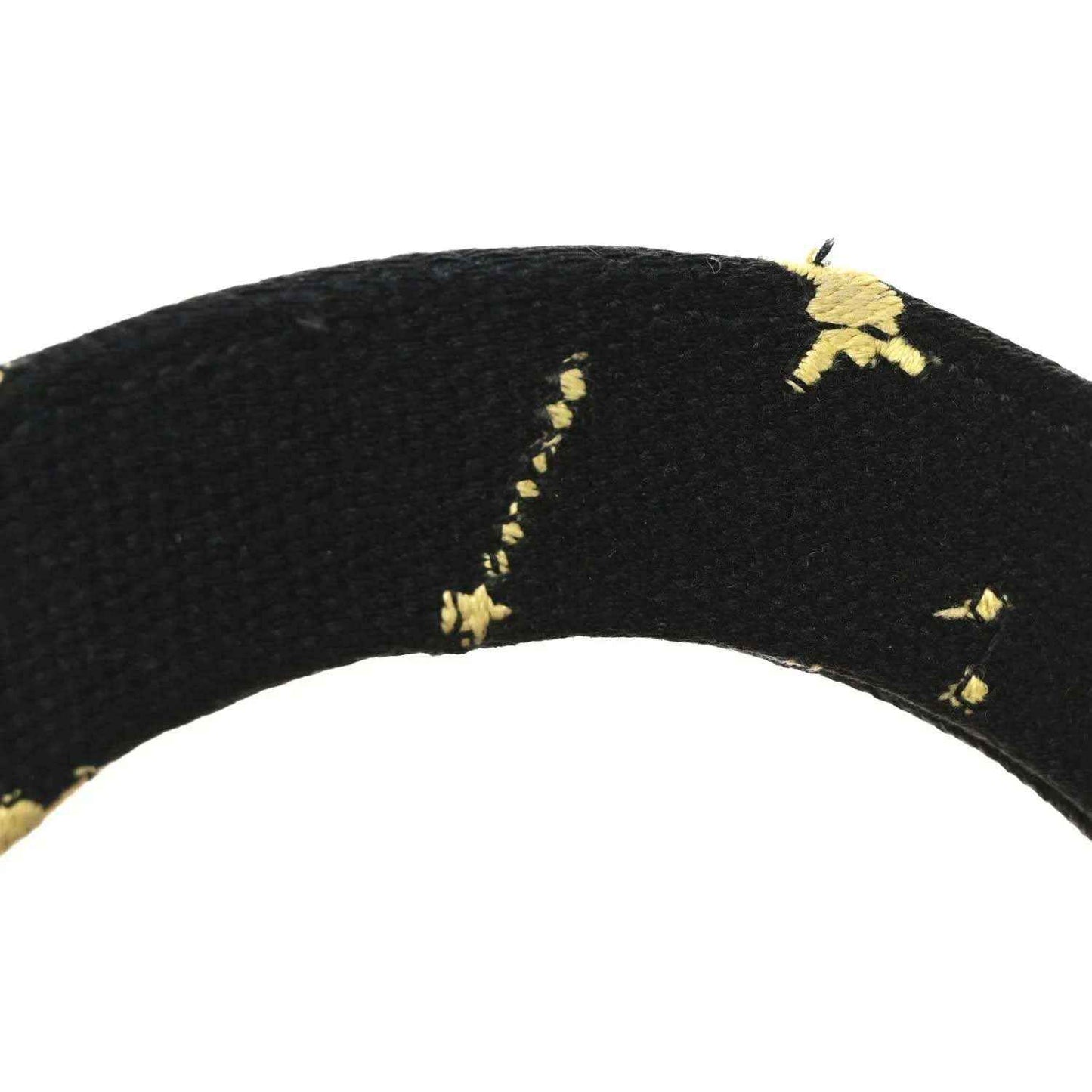 Black canvas bag strap with small gold star and constellation embroidery