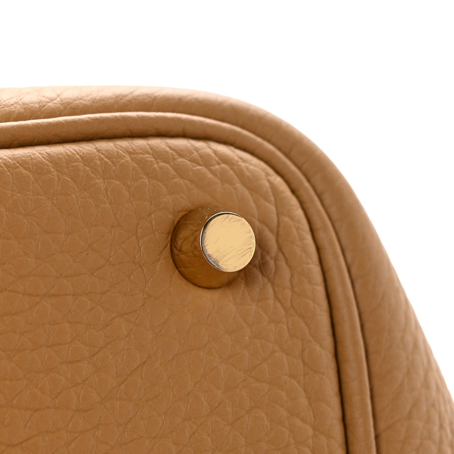 Biscuit tan textured leather bucket bag with round lock hardware