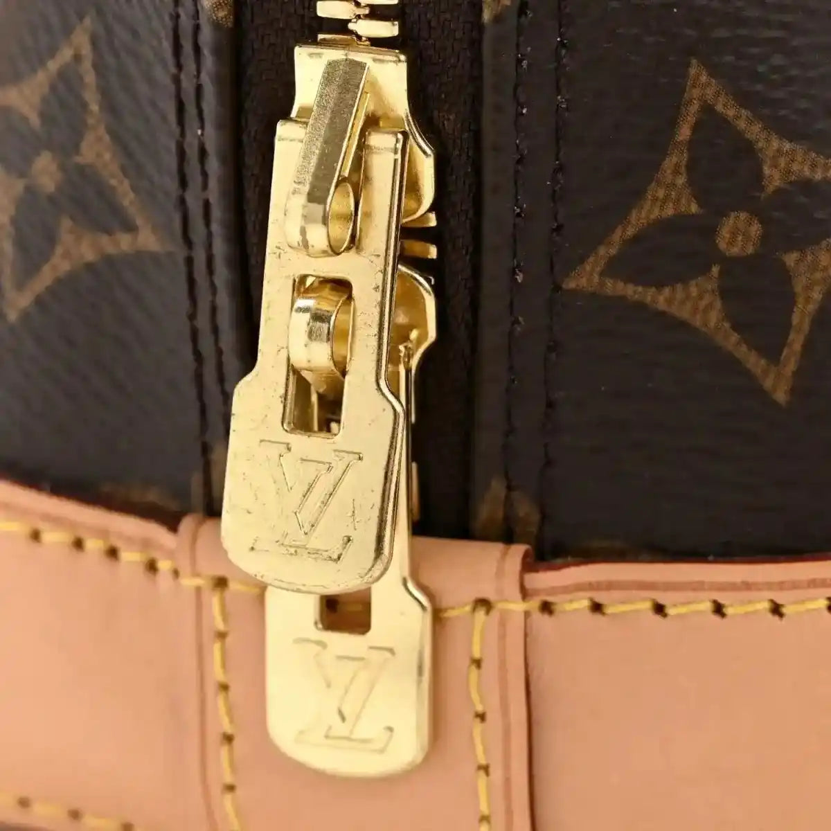 Louis Vuitton monogram Alma BB small tote bag with gold clasp and leather strap