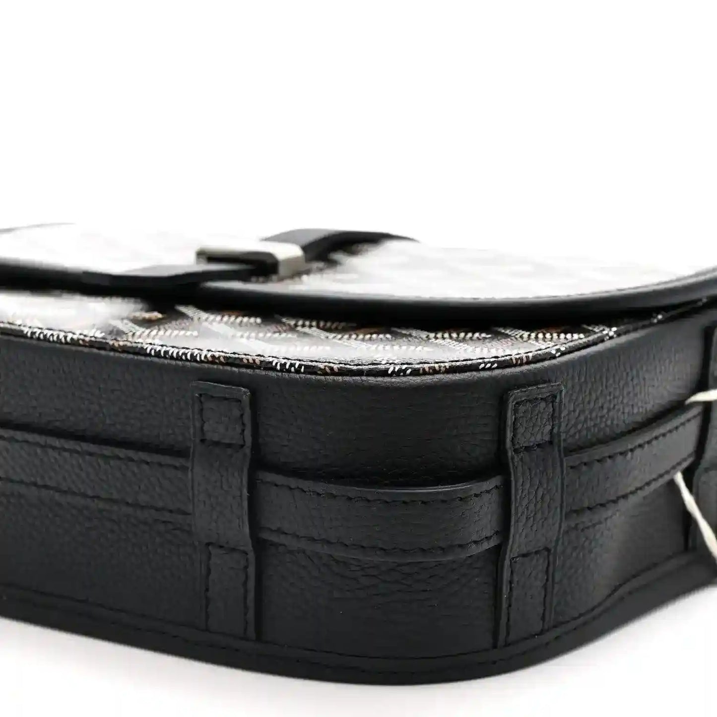 Black leather messenger bag top edge with zipper opening and embossed detailing
