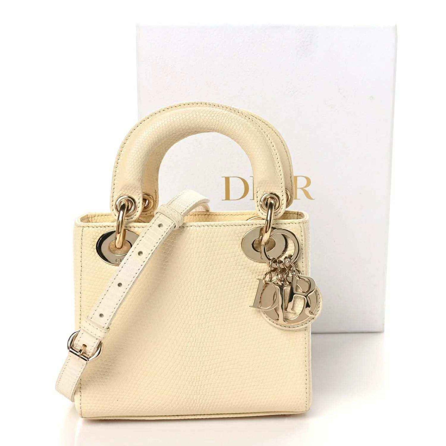 Mini Lady Dior handbag, textured light beige with white strap and gold-tone hardware