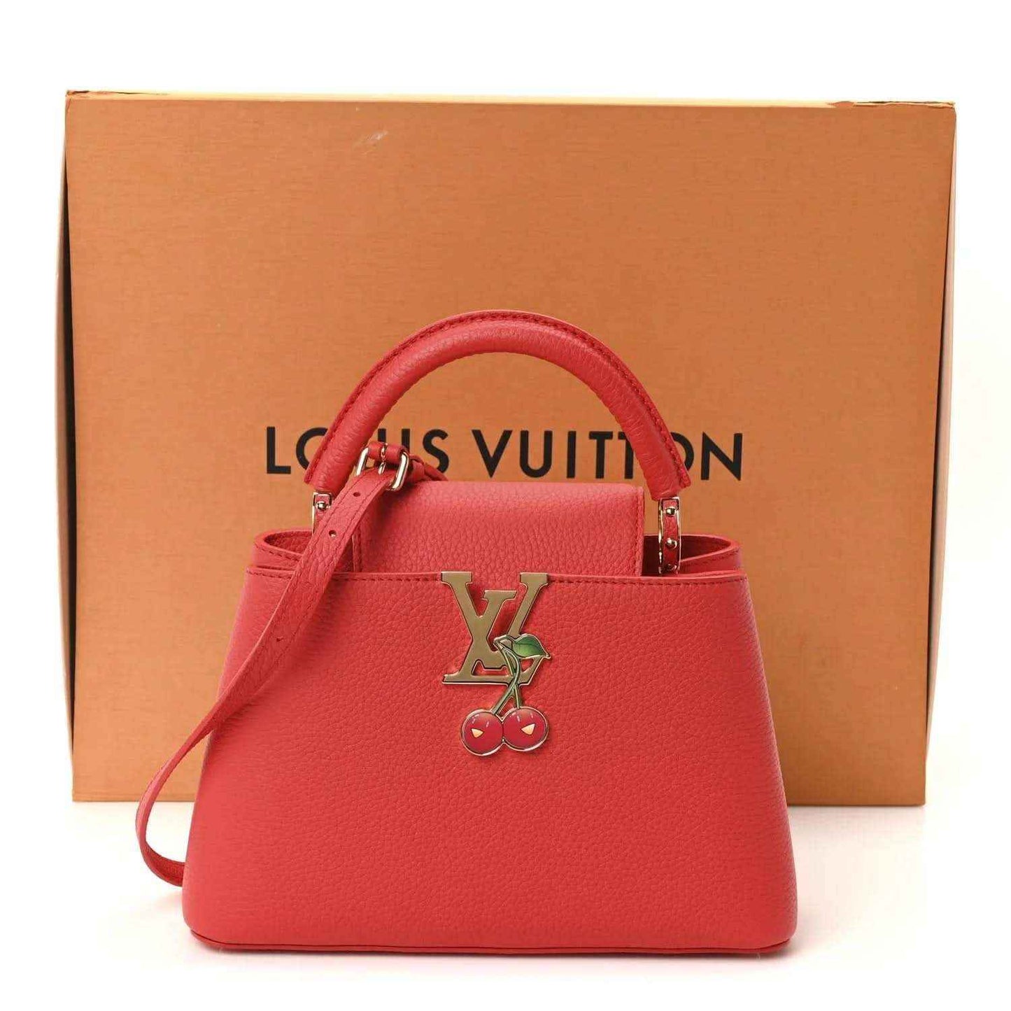 Red leather mini handbag with LV cherry charm, top handles, and included dust bag.