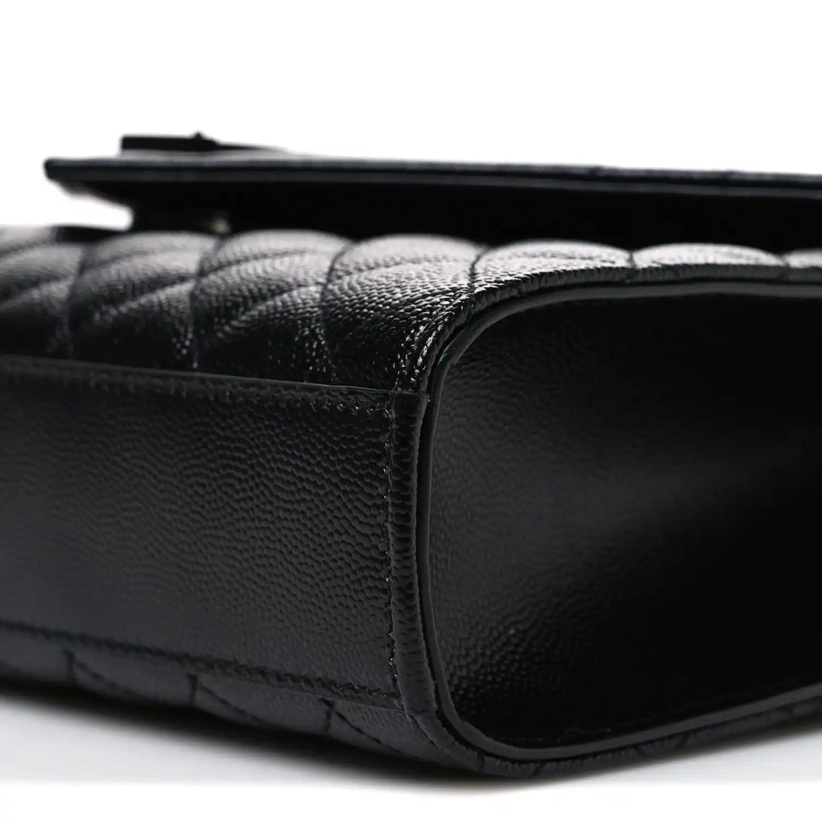 Saint Laurent black satchel side profile with rounded leather corner and trim stitching