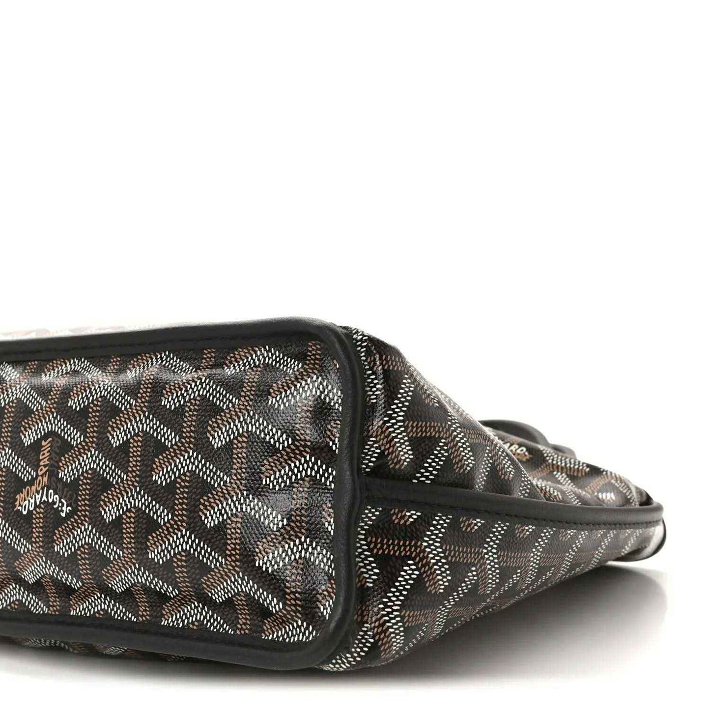 Reversible mini pouch bag side view with black zipper trim and patterned canvas