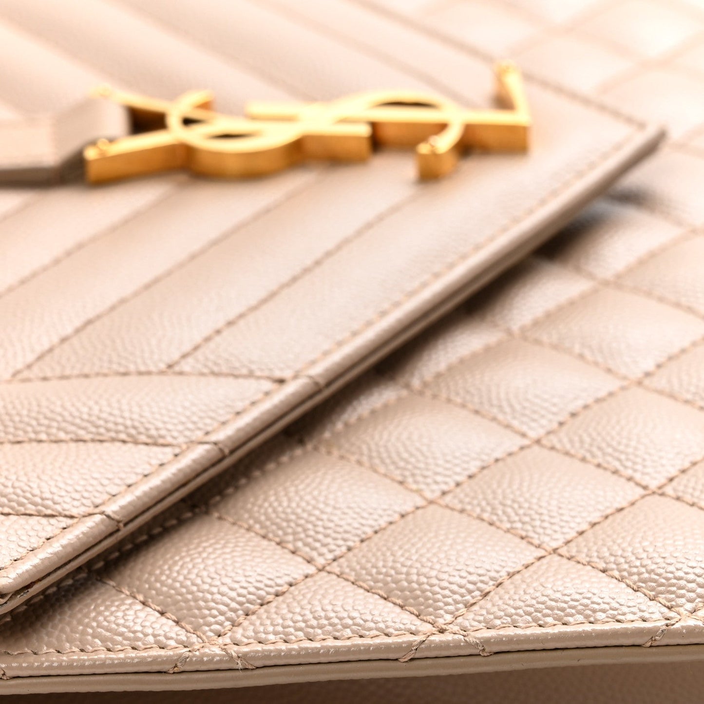 Dark beige quilted satchel with gold chain and YSL logo tag