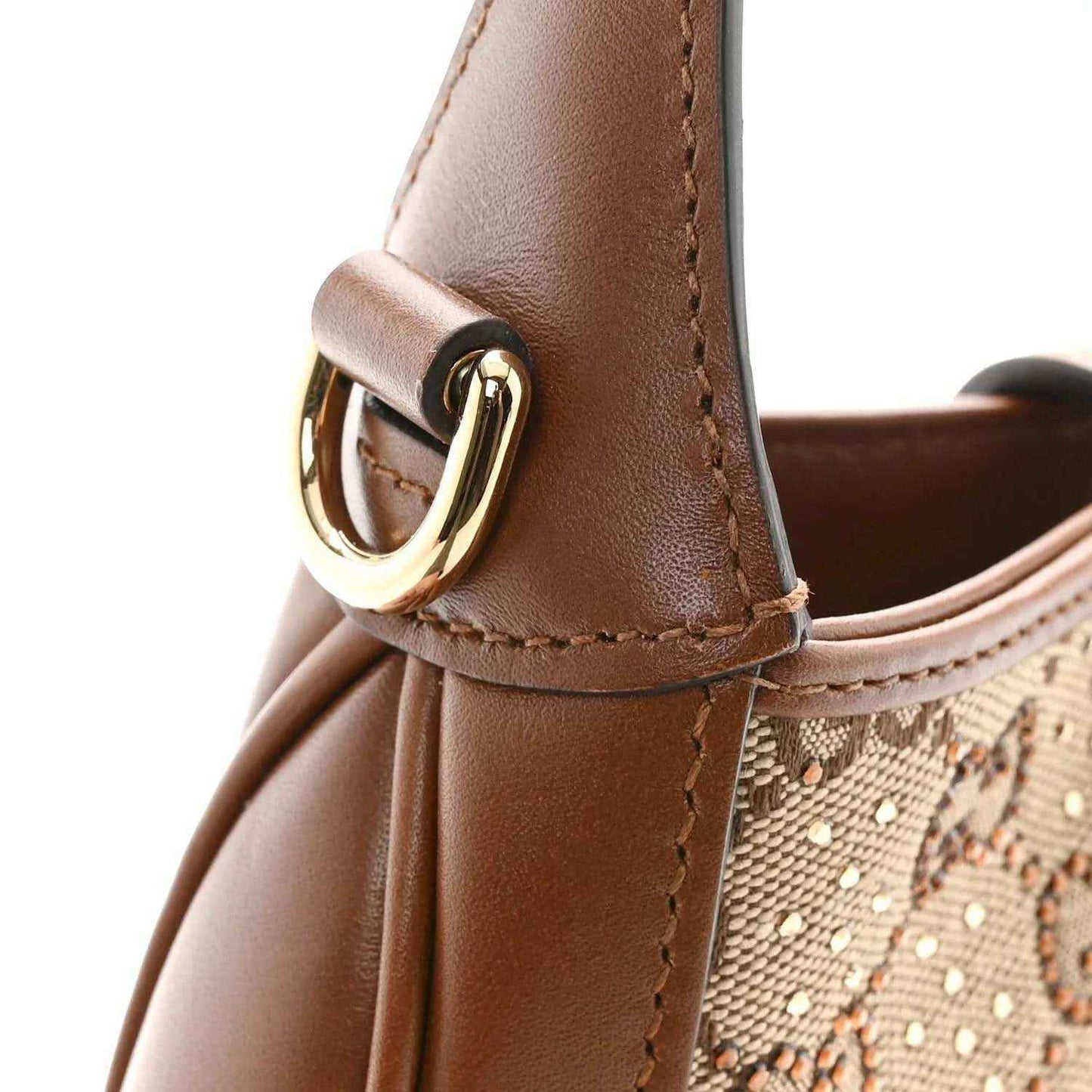 Brown leather mini hobo bag with gold-tone ring buckle and crystal GG monogram canvas