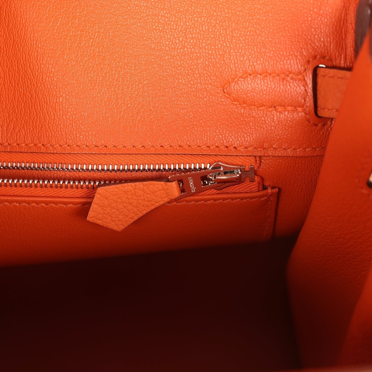 Hermes Birkin 25 handbag interior with zip pocket and small leather divider tag