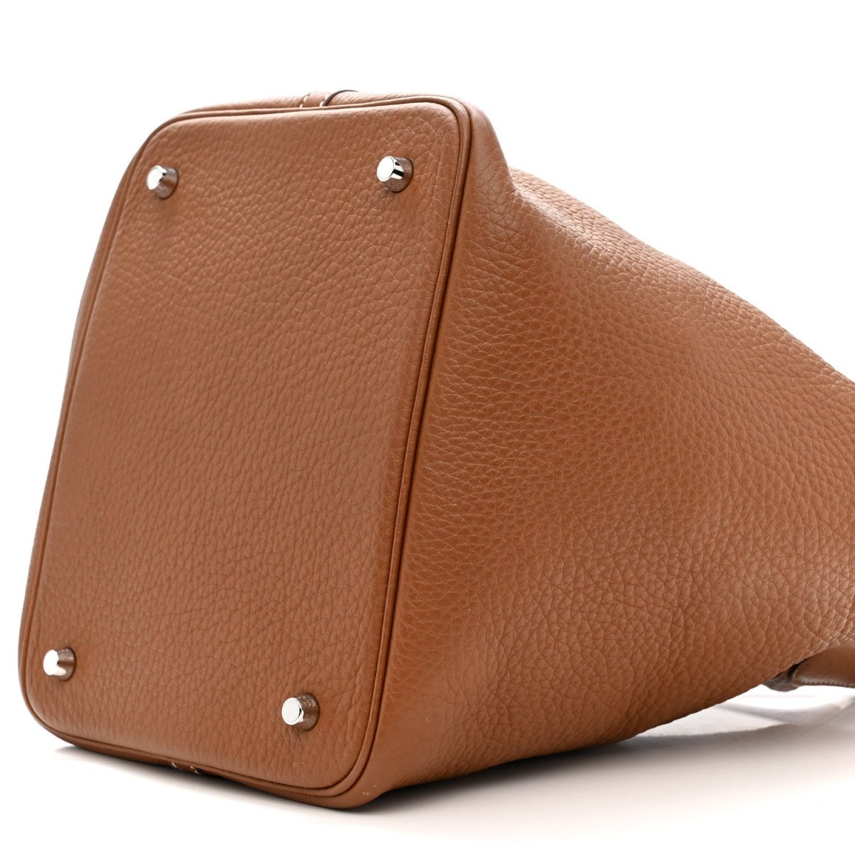 Gold leather tote bag side panel with four silver corner studs