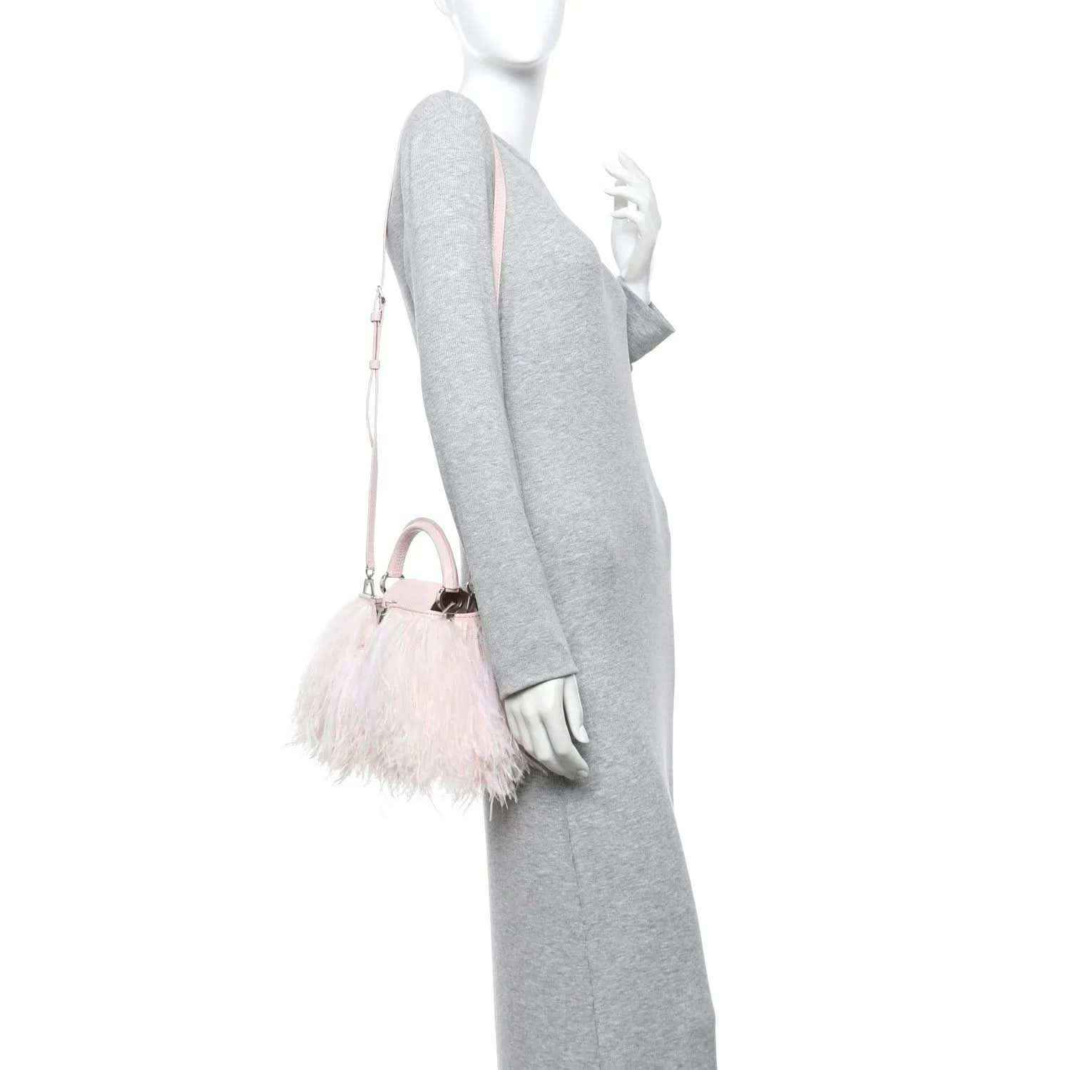 Louis Vuitton mini top-handle bag with pale pink feathers and short shoulder strap