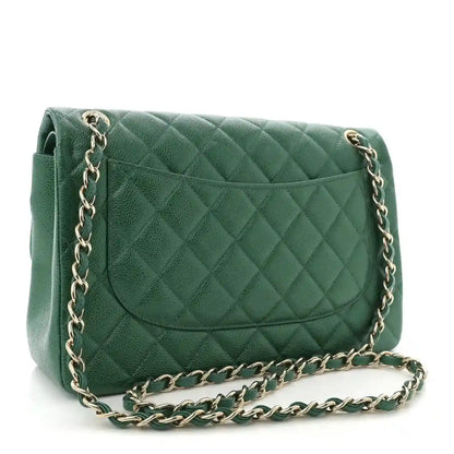 Green quilted leather flap bag with gold-tone chain strap and front pocket detail.