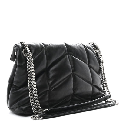 Black quilted lambskin small satchel with chain strap and diamond puffer stitching.