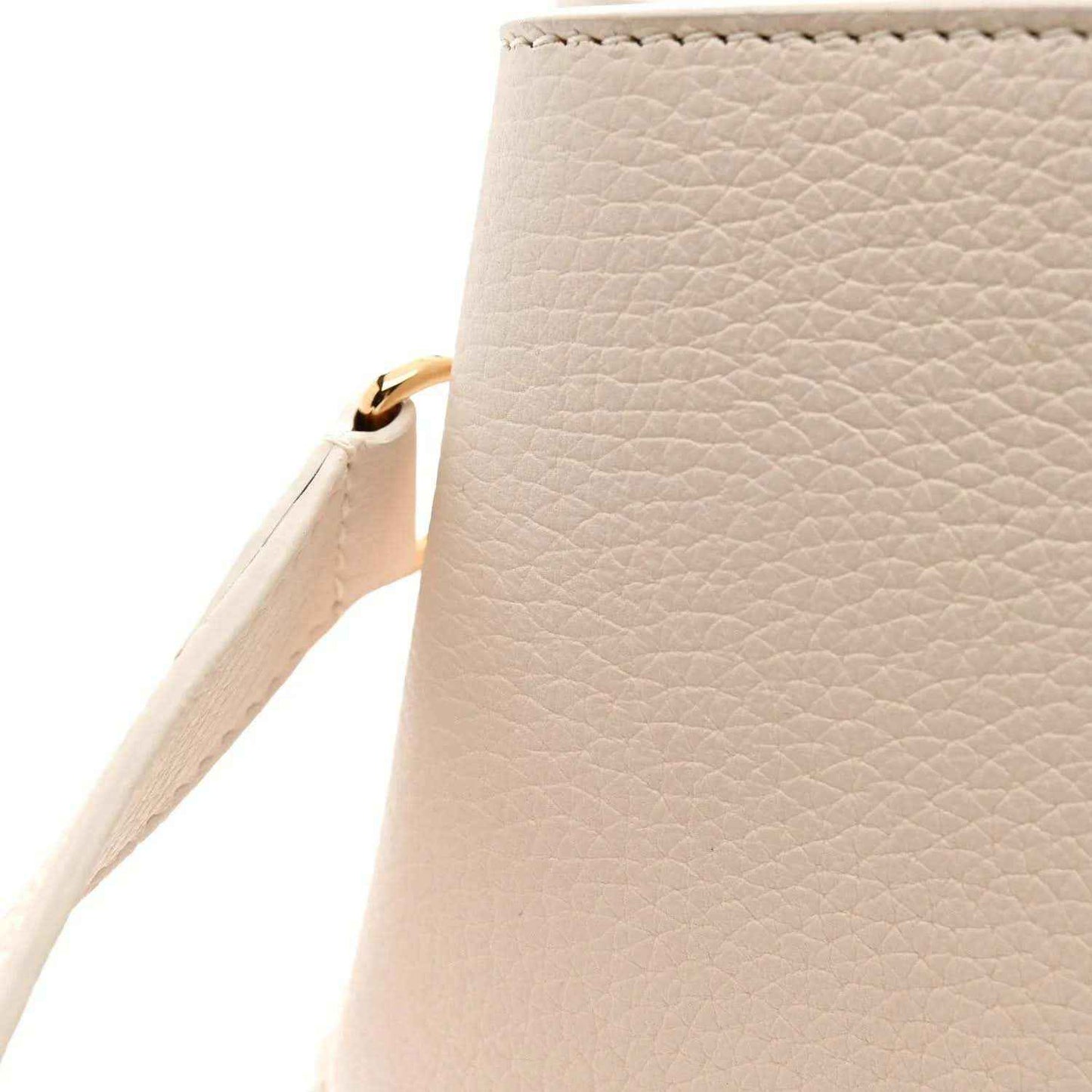 Louis Vuitton textured leather side with crossbody strap loop and gold hardware