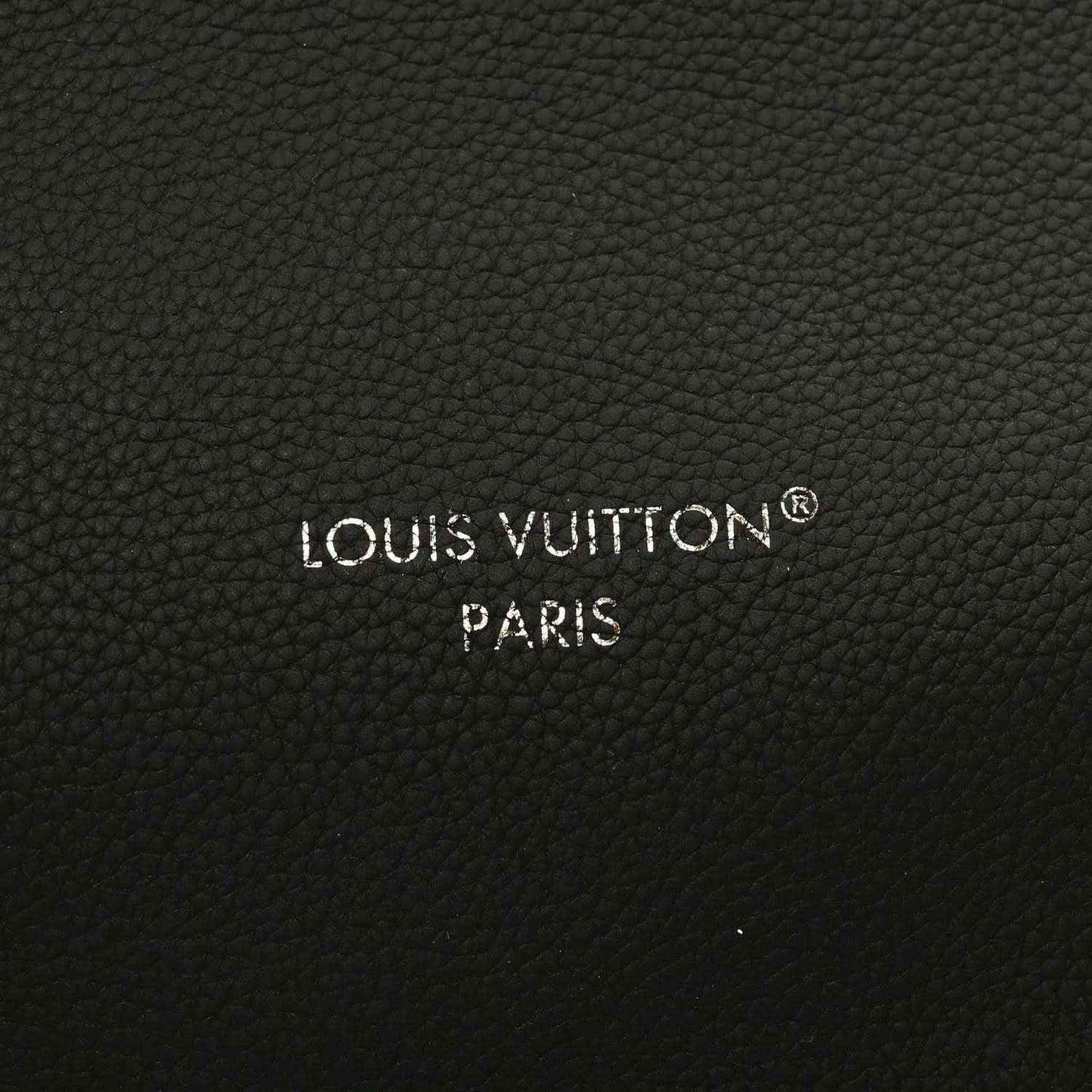 Black leather lining with Louis Vuitton Paris logo embossing