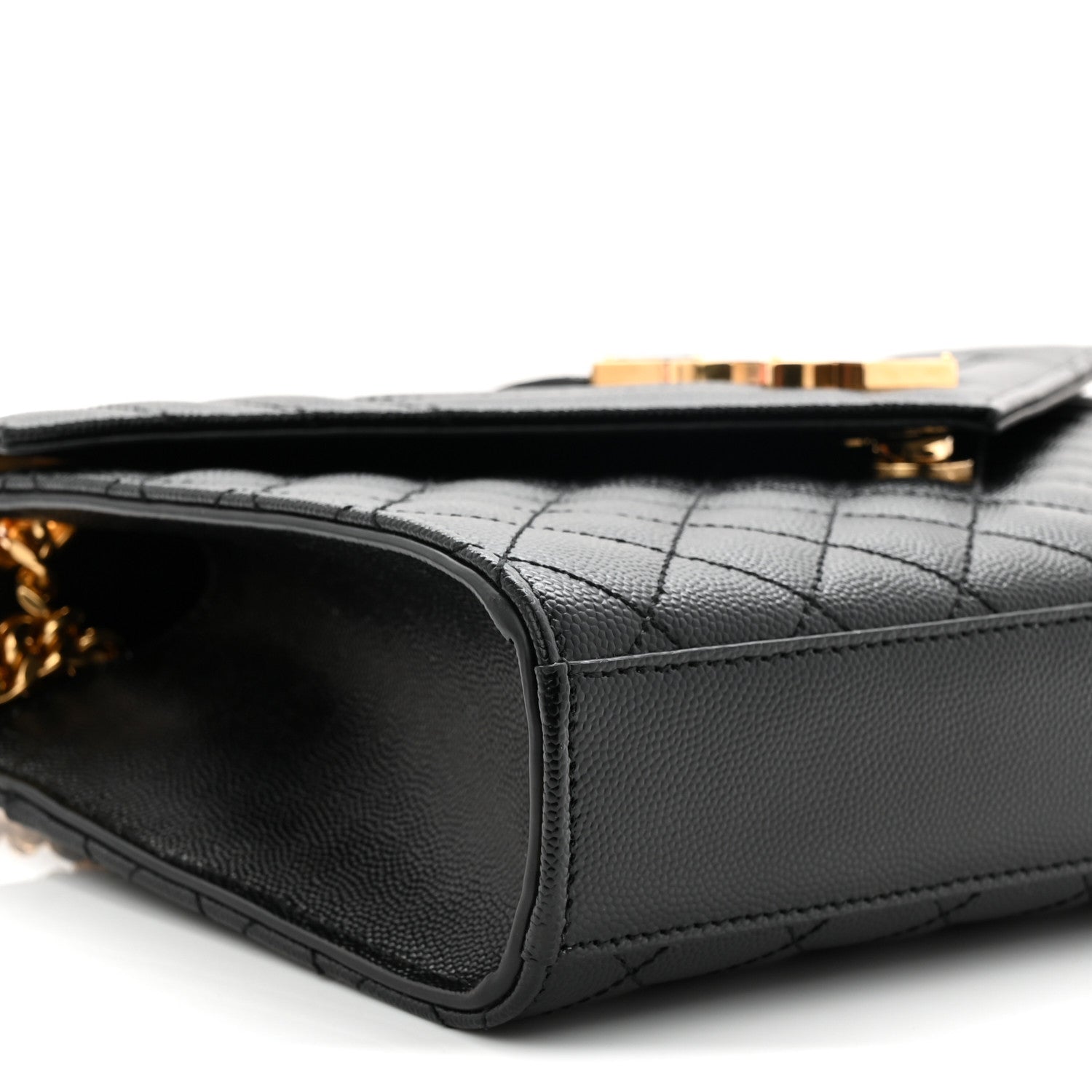 Black leather satchel with quilted panels and rounded corner trim detail