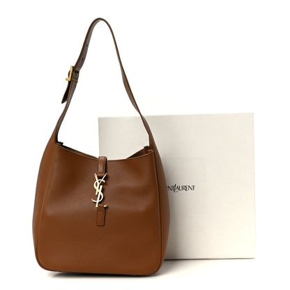 Brown smooth calfskin hobo bag with YSL logo charm and single top handle