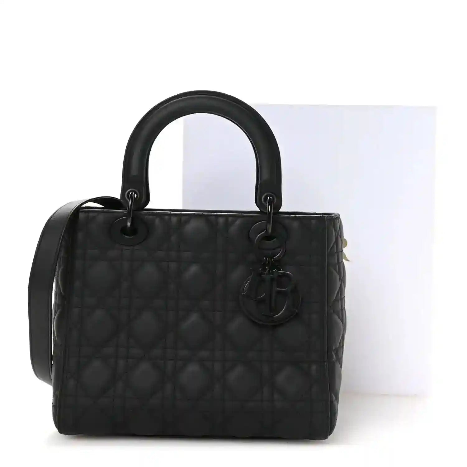Medium Lady Dior bag in black matte calfskin with Cannage pattern, top handles and CD charm