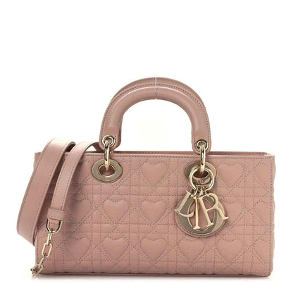 Medium lambskin handbag in pale pink with quilted pattern and top handles