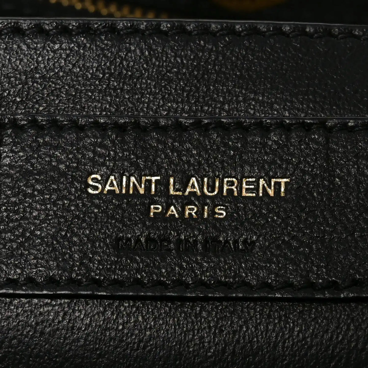 SAINT LAURENT PARIS logo stamp on black leather lining
