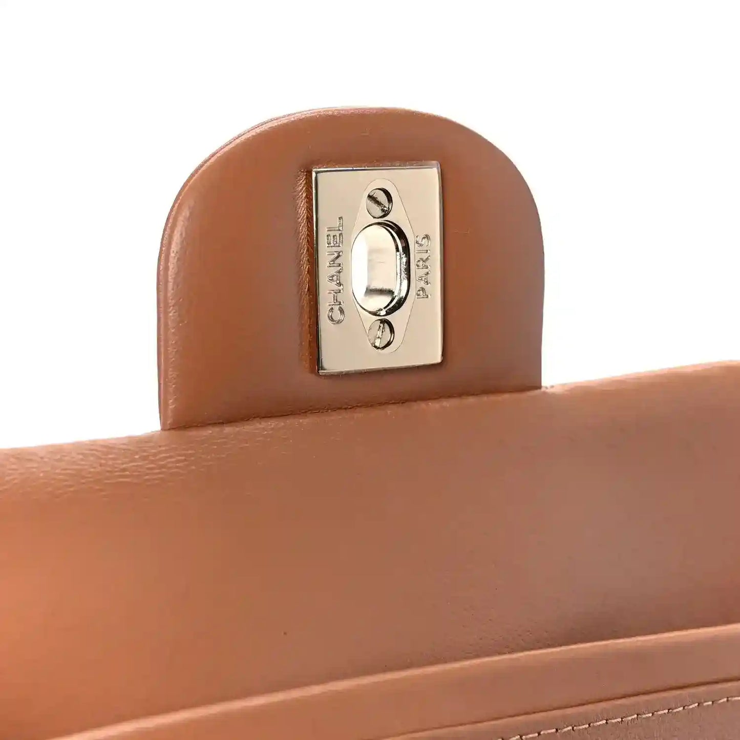 Silver-tone CHANEL turn-lock clasp on brown leather flap; quilted stitching around it.