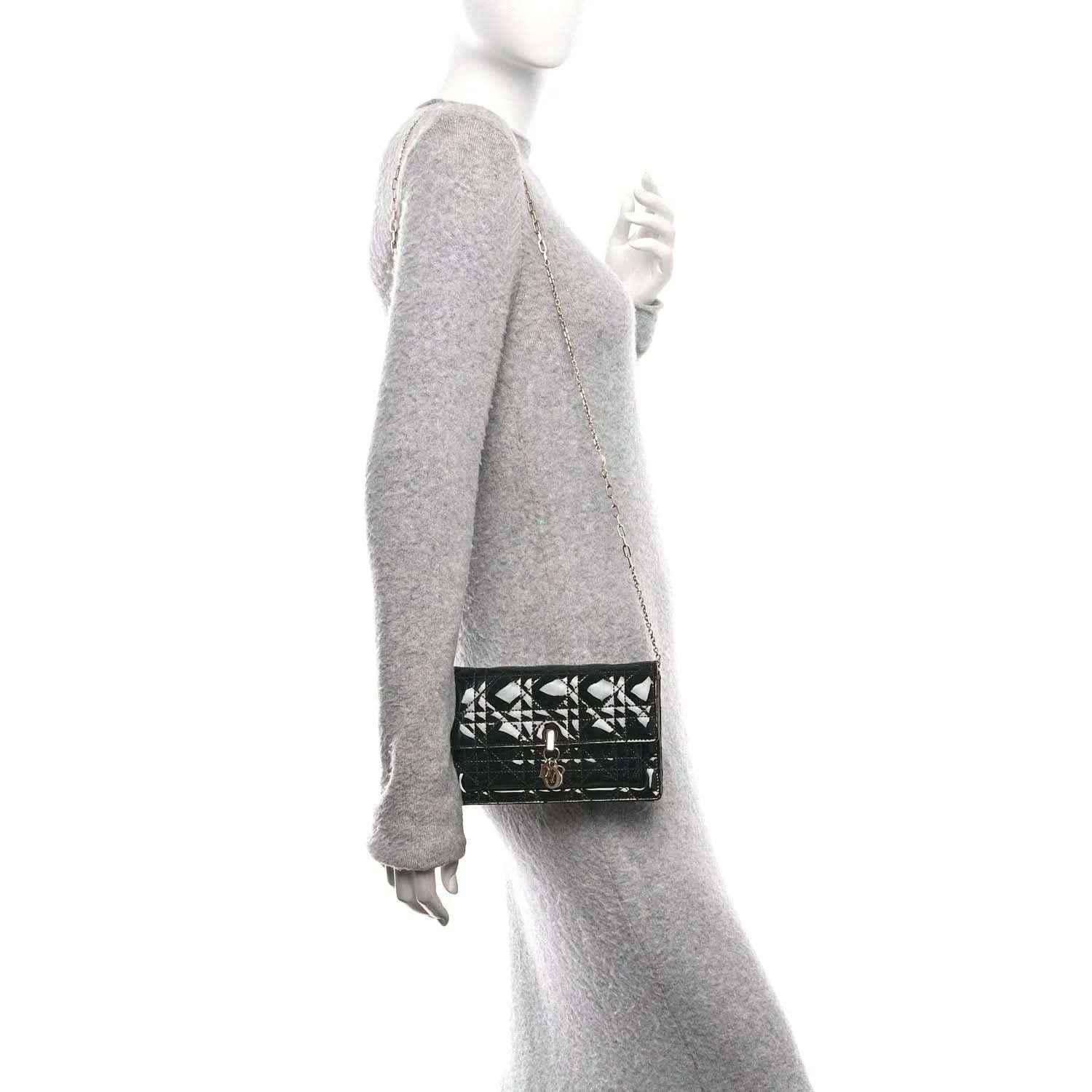 Black patent cannage Lady Dior chain pouch worn crossbody with chain strap