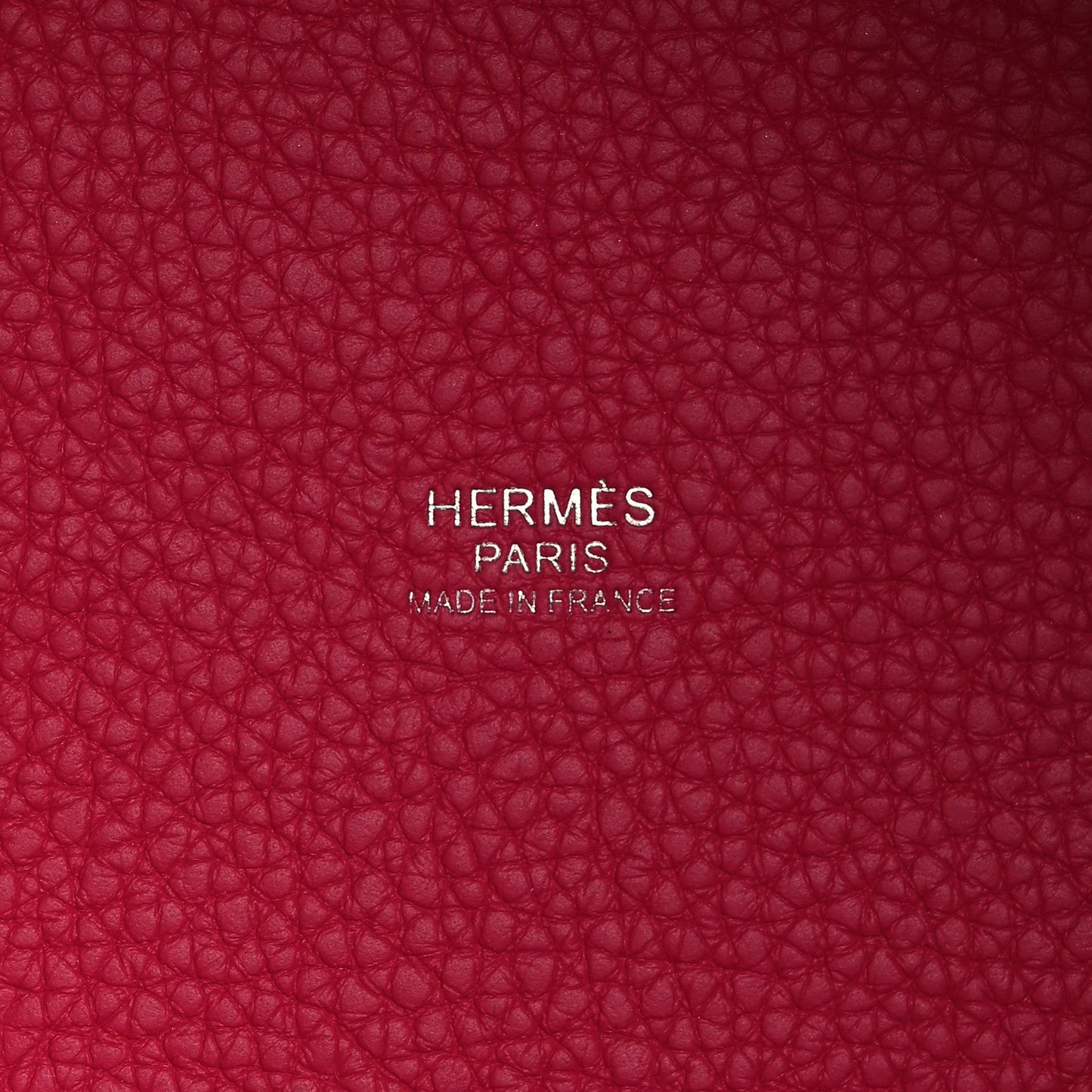 Rose pink leather bucket tote with 'HERMÈS PARIS' stamp