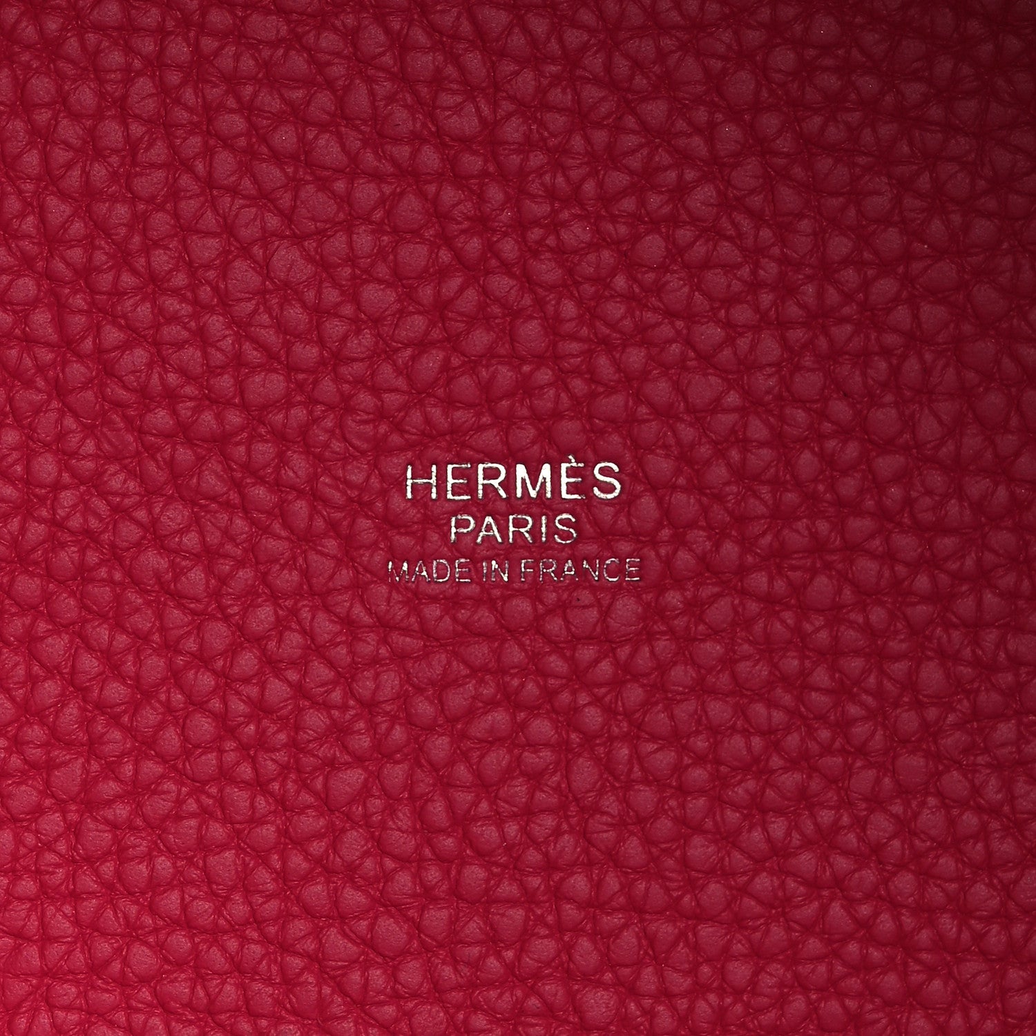 Rose pink leather bucket tote with 'HERMÈS PARIS' stamp