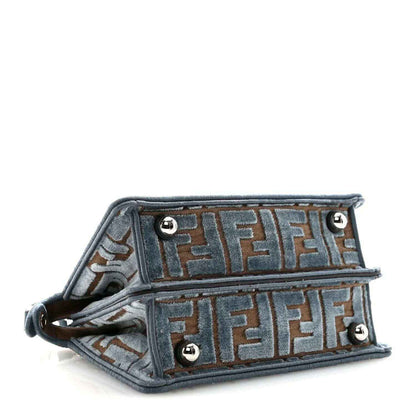Small satchel interior view with FF jacquard lining and two silver snap buttons