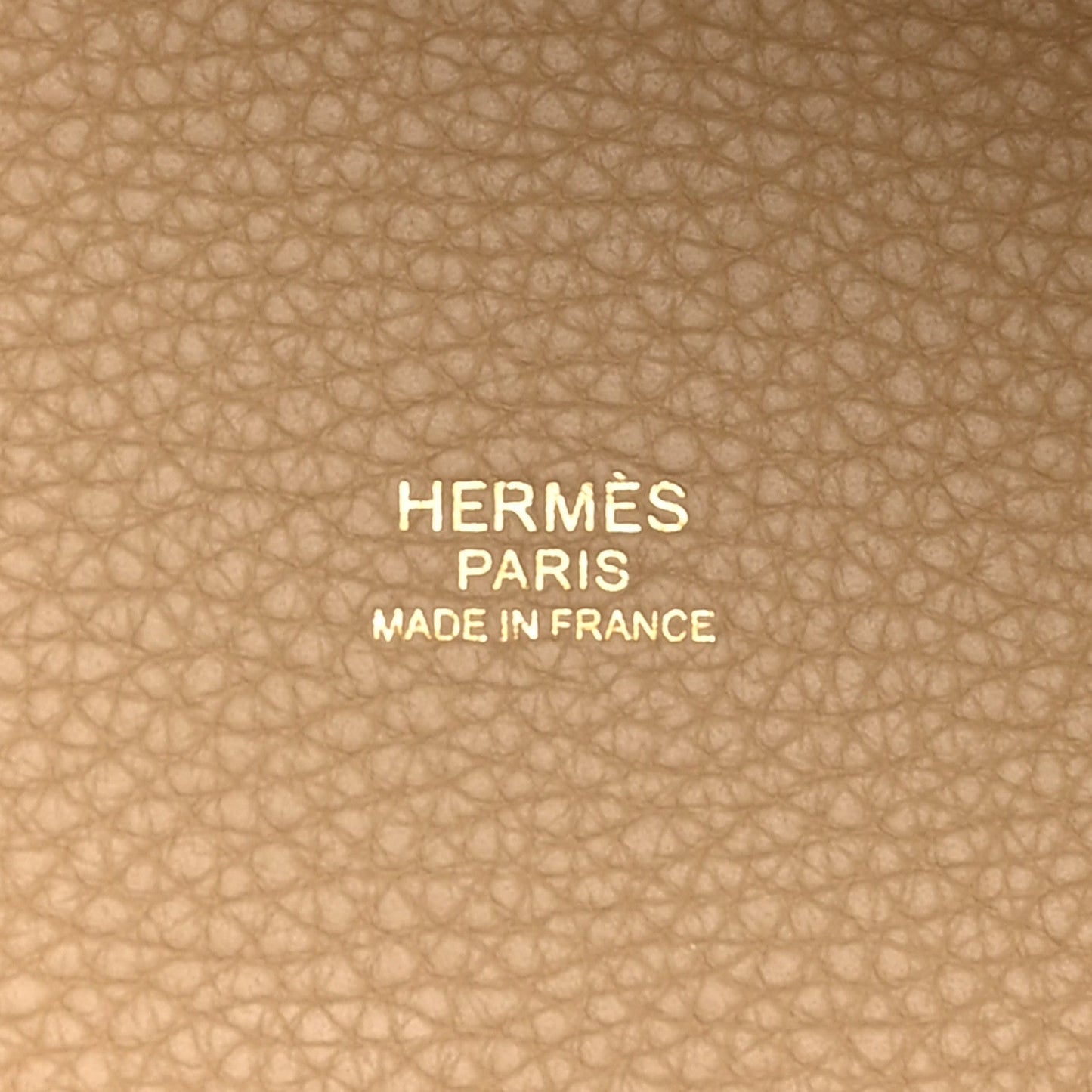 Beige leather lining text: HERMES PARIS MADE IN FRANCE