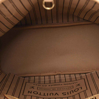 Louis Vuitton tote bag interior with stitched lining and LV label