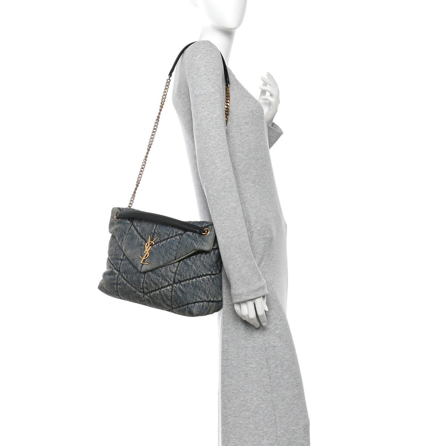 Denim quilted puffer satchel with gold chain strap shown on mannequin